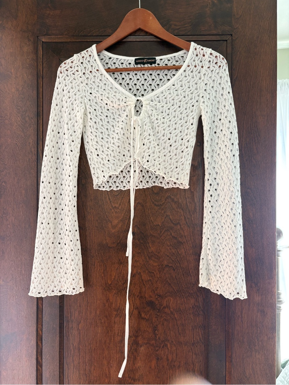 Almost Famous Cream Crochet Tie-Front Long-Sleeve Crop Top